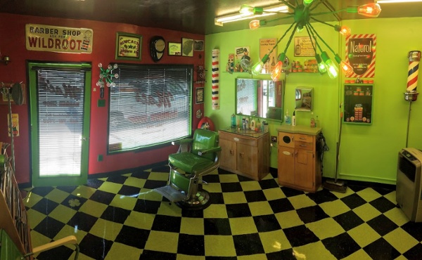 The colorful vintage interior of Mac's Barber Shop